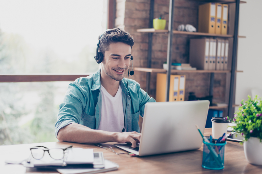 A man sitting at a computer